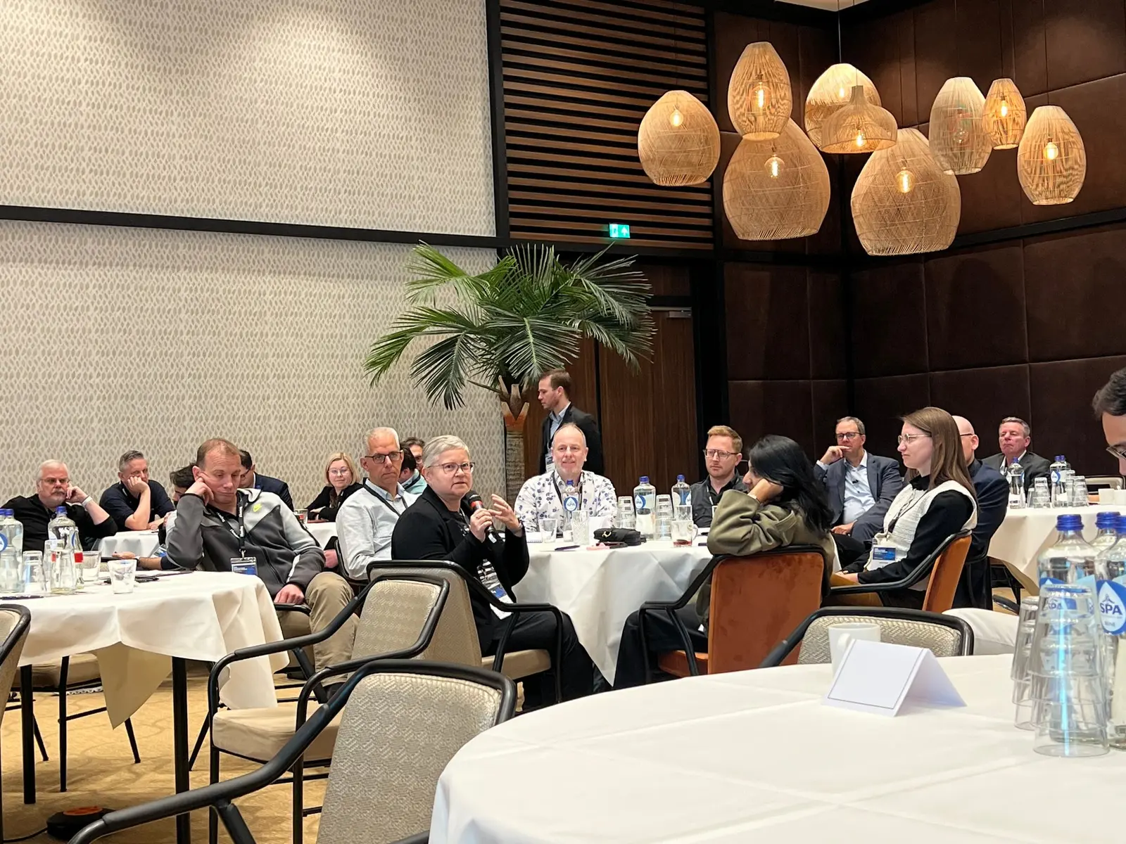 A full room of EHS leaders in discussion